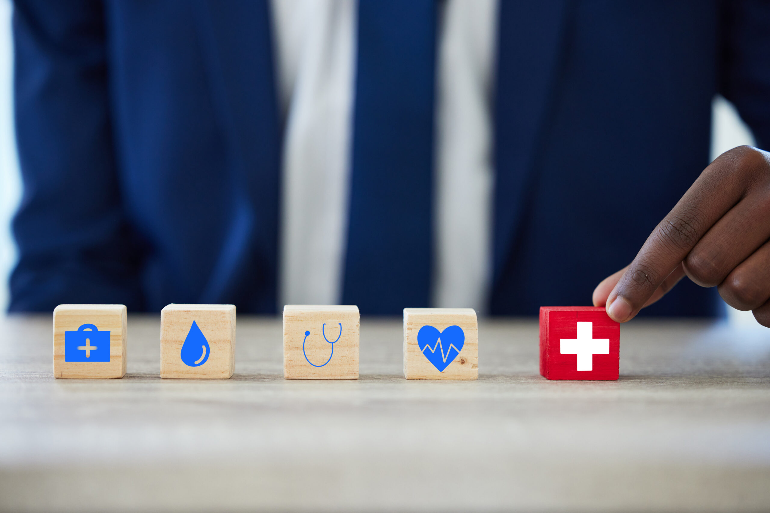 hand building blocks security with insurance health office protection solution puzzle person agent wood toys with cross cardiology icon risk cover service company scaled